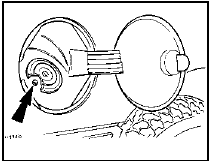 37.2 Fuel filler housing securing screw (arrowed)