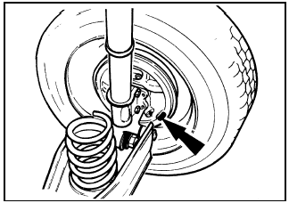 17.1a Brake shoe viewing hole location (arrowed) in backplate