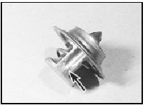 7.9 Thermostat flow direction markings (arrowed)