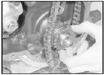 15.12 Sliding the double chain sprocket from the end of the crankshaft