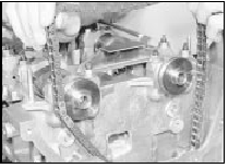 15.13 Withdrawing the timing chain through the top of the timing case