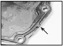 15.31 Lower timing chain cover rubber gasket in position. Ensure that lug on