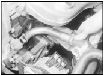 9.15 Disconnect the coolant elbow from the coolant pump