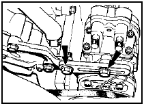 21.4 Typical air conditioning compressor mounting and pivot bolts (arrowed)