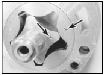 27.9 The punch marks (arrowed) on the oil pump rotors must face the pump