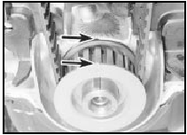 18.6a TDC lug on crankshaft sprocket aligned with notch in oil pump flange -