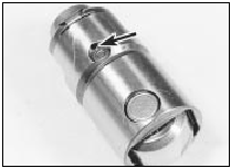 23.9a Hydraulic cam follower oil port (arrowed) - 1.8 litre (R2A)