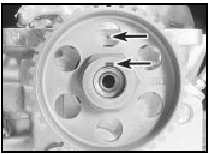 23.20 Camshaft sprocket keyway aligned with dot on cylinder head - 1.8 litre