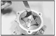 31.10b Checking the oil pump inner-toouter rotor clearance