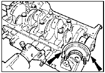 34.22 Coat the arrowed areas of the rear main bearing cap with sealant