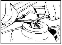 4.7 Hold the strut piston rod with a 6 mm Allen key when unscrewing the upper