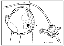 14.8 Disengaging the petrol flap catch from the housing