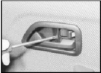 17.9 Remove the interior door handle surround securing screws