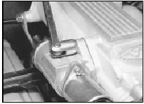 13.3 Unscrewing an idle speed control valve retaining nut