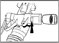 4.3 Ignition switch lock barrel spring clip location (arrowed)