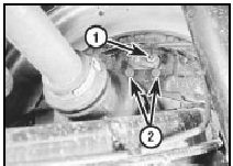 10.4 Fluid pipe union (1) and wheel cylinder retaining bolts (2)