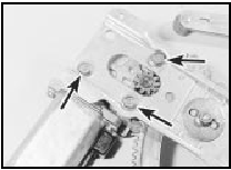 49.5 Electric window motor securing bolts (arrowed)