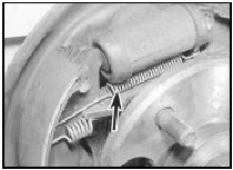 5.6a Top shoe return spring (arrowed)