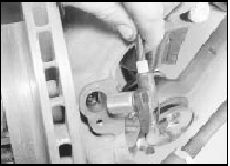22.3 Unscrew the mounting bolt and withdraw the front wheel sensor - ABS