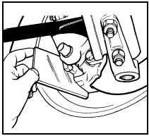 16.1 Checking the front disc pad wear using a mirror