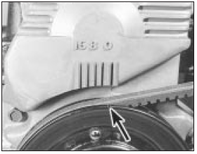 4.3a Crankshaft pulley notch (arrowed) aligned with TDC (0) mark on belt