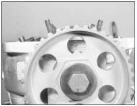 4.10b . . . and camshaft sprocket timing mark aligned with TDC mark on