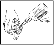 6.17b Using a soldering iron to heat the slip ring end housing - Mitsubishi