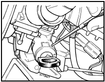 10.7 Ignition switch removal using a pointed tool to depress the lock spring