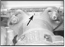 5.45a Distributor mounting flange and cylinder head punch marks (arrowed) -