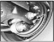 8.5 Handbrake adjustment plunger location (arrowed) on backplate