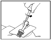 22.8 Separating apportioning valve pushrod from adjusting bracket