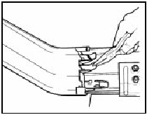 6.19 Removing rear quarter bumper retaining tangs - pre-1986 models