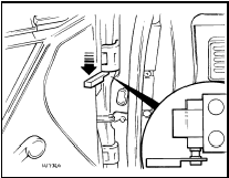 12.10b Front door upper hinge pin removal using special tool - 1986 models