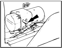 23.9 Bypass valve (arrowed) on side of power-operated folding roof fluid pump